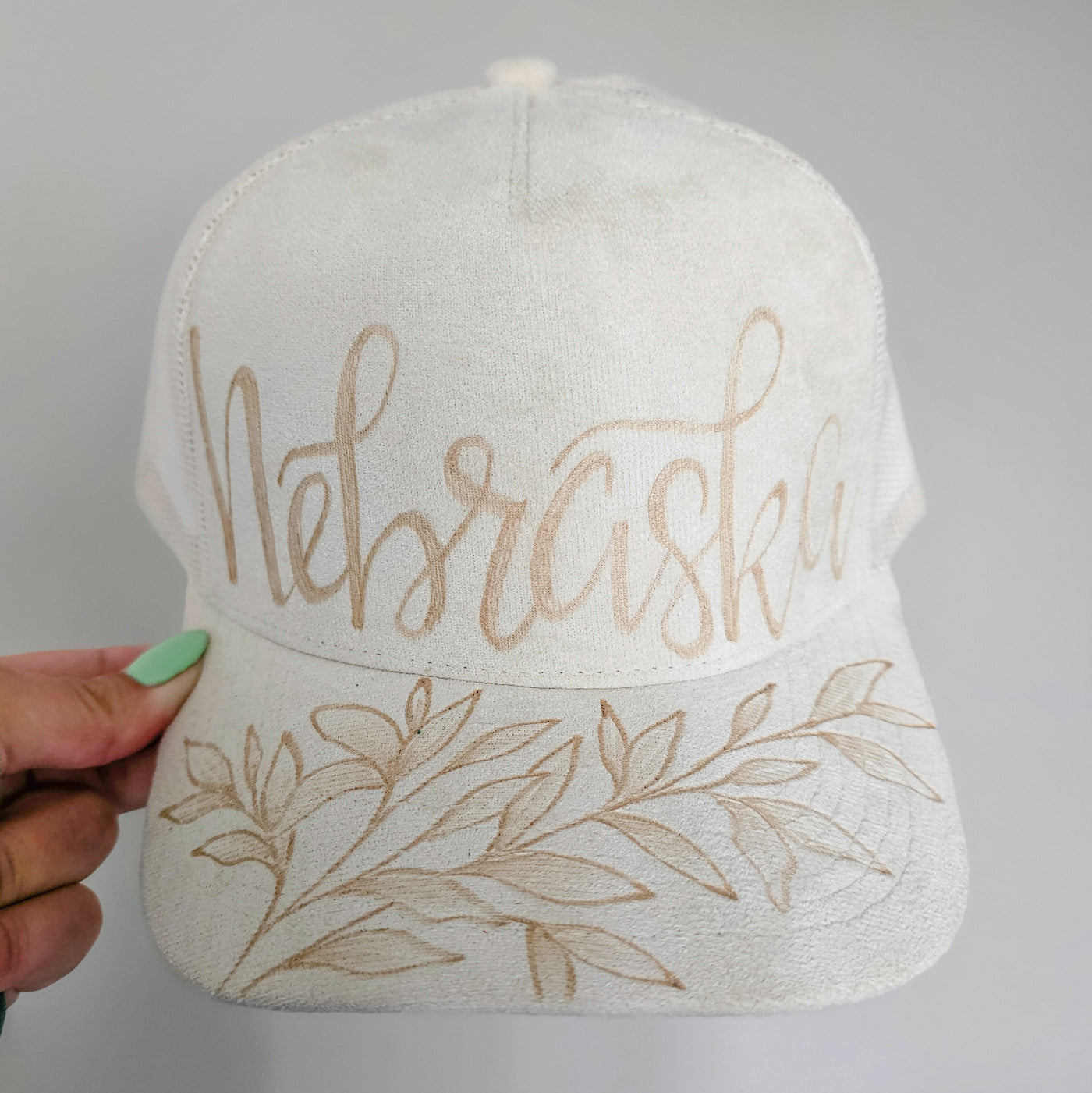 Nebraska || Ivory Suede Baseball Style Mesh Trucker Hat || Freehand Burned
